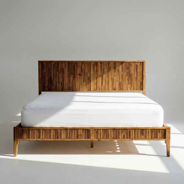 Fluted Acacia Wood Bed Frame styled with linen bedding in a warm bedroom