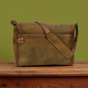 Treated Bovine Leather Buckled Messenger Bag