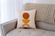 Geometric Print Linen-Blend Throw Pillow layered on a neutral sofa with throw blanket