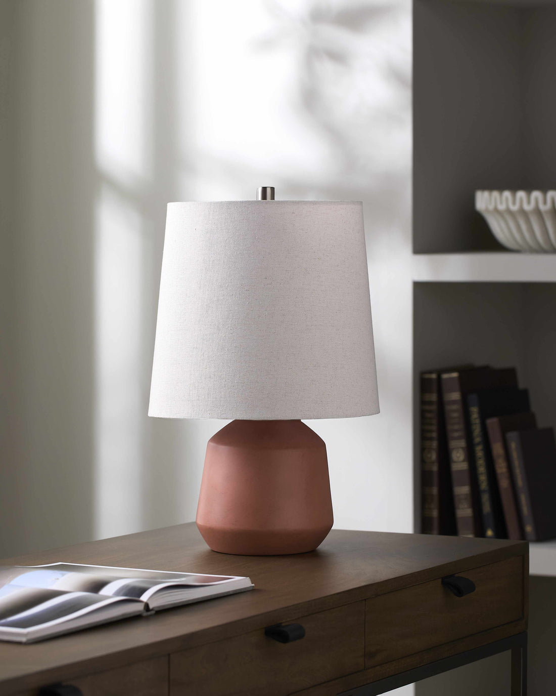 Matte Ceramic Terracotta Table Lamp — Matte terracotta ceramic base with a linen drum shade for quiet evening light