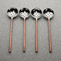 Copper-Finish Perforated Olive Spoon Set — Four perforated spoons with copper-finish handles for olives and bar snacks
