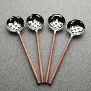Close-up of material and construction detail — Copper-Finish Perforated Olive Spoon Set