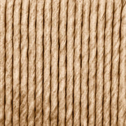 Woven Rattan Swivel Outdoor Accent Chair — styled in a complete room vignette
