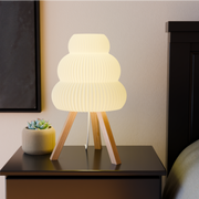 Close-up of wood-grain texture and touch control detail — Sculpted Shade Tripod Table Lamp