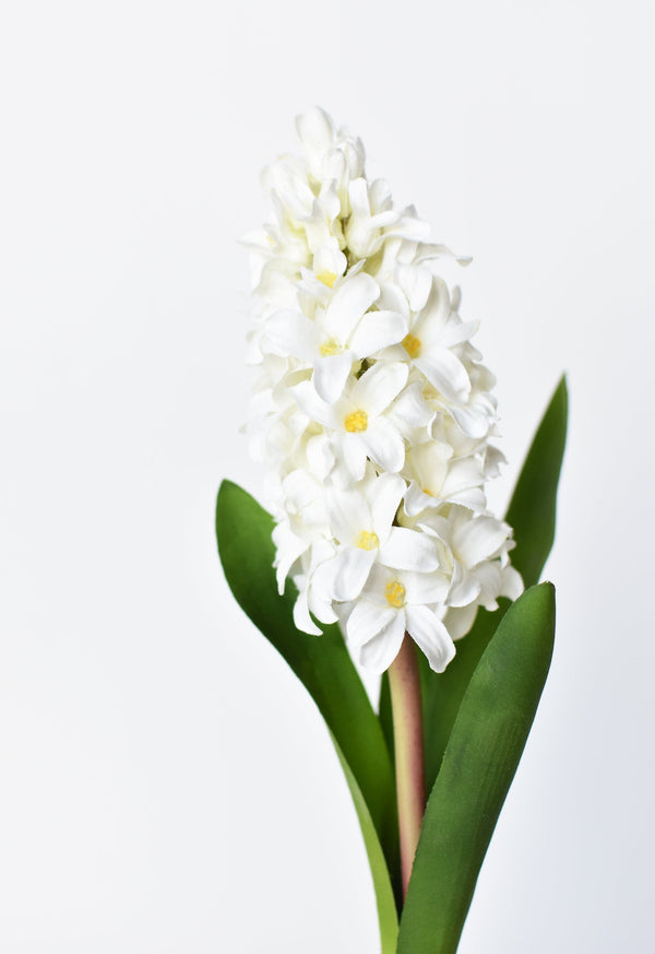 Soft White Faux Hyacinth Stem in a styled home setting