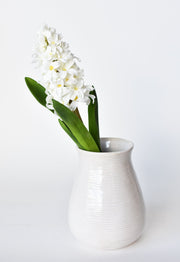 Close-up of concrete texture and surface finish detail — Soft White Faux Hyacinth Stem