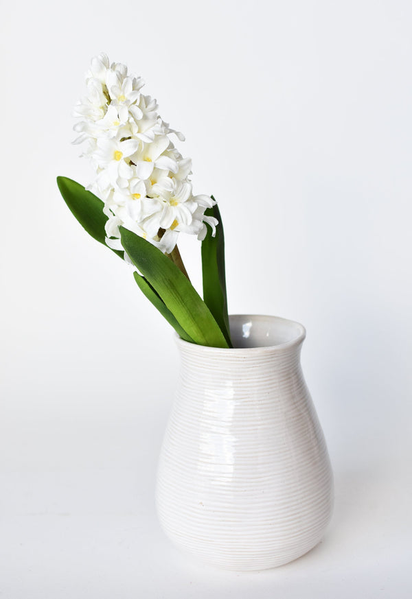 Close-up of concrete texture and surface finish detail — Soft White Faux Hyacinth Stem
