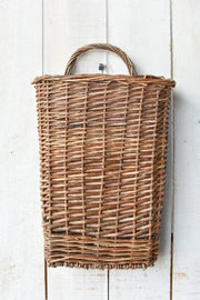 Close-up of hand-knotted macrame and fiber texture detail — Woven Willow Wall Basket