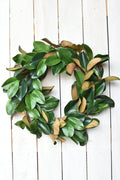 Faux Magnolia Leaf Round Wreath — Two-toned faux magnolia leaves on a twig base, 27 inches across