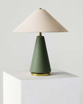 Matte Ceramic Cone Table Lamp — Matte green ceramic base with brass accents and fabric shade for ambient lighting