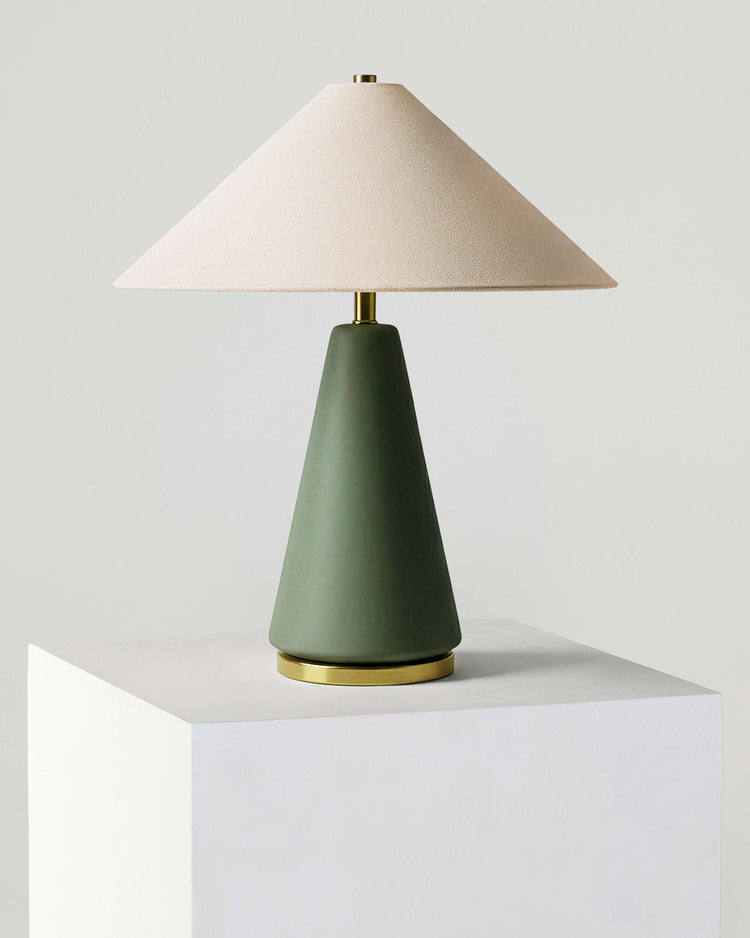 Matte Ceramic Cone Table Lamp — Matte green ceramic base with brass accents and fabric shade for ambient lighting