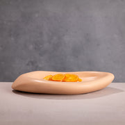 Micro Terrazzo Sculpted Serving Platter — styled in a complete room vignette