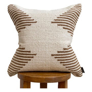 Kilim-Weave Geometric Pillow Cover layered on a neutral sofa with throw blanket