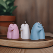Close-up of hand-poured soy wax surface and cotton wick — Sculptural Hugging Figure Soy Candle