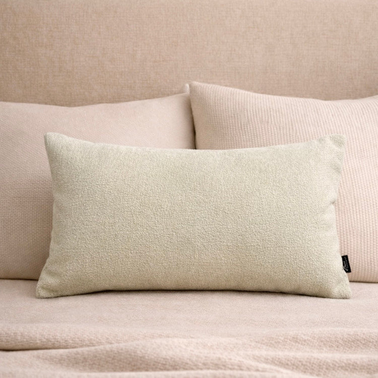 Cream Sherpa Lumbar Pillow Cover — Nubby sherpa lumbar cover in warm cream with hidden zipper closure