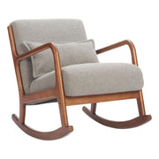 Boucle Upholstered Wood Rocking Chair styled on a sunlit patio with side table