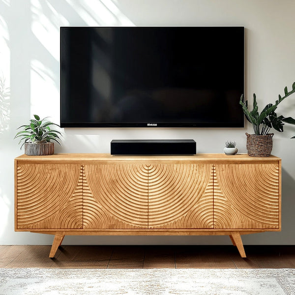 Relief-Carved Wood TV Stand — Relief-carved doors and splayed legs on a 71-inch wood-grain media cabinet