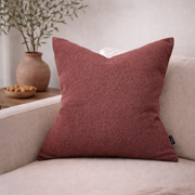 Rust Bouclé-Texture Pillow Cover — Looped bouclé-style cover in deep rust with a hidden zip closure