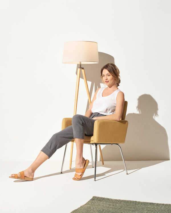 Linen Shade Tripod Floor Lamp styled in a warm reading corner
