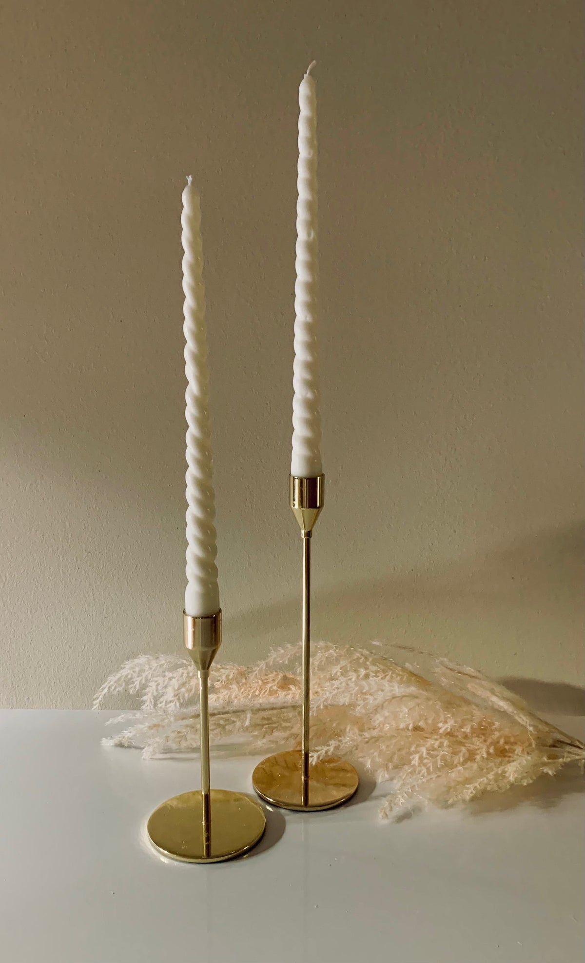 The quiet ritual of lighting two tapers