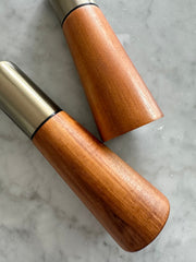 Acacia Wood Salt Pepper Grinder Set in a styled home setting