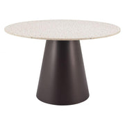 Terrazzo-Print Round Pedestal Dining Table styled in an outdoor dining setting