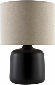 Matte Ceramic Drum Shade Table Lamp styled with ceramics and a linen runner