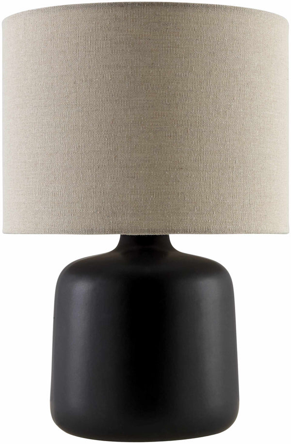 Matte Ceramic Drum Shade Table Lamp styled with ceramics and a linen runner