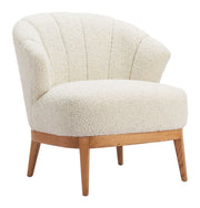 Boucle Channel-Back Accent Chair styled on a sunlit patio with side table
