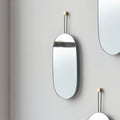 Close-up of glass clarity and rim detail — Brass-Hung Oval Wall Mirror