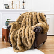 Tonal Stripe Faux Fur Throw draped over a linen sofa arm