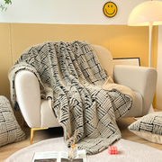Basket-Weave Faux Fur Throw — folded throw showing texture and weight