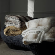 Long-Pile Faux Fur Throw Blanket — close-up of label and production detail