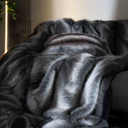Long-Pile Faux Fur Throw Blanket — folded throw showing texture and weight