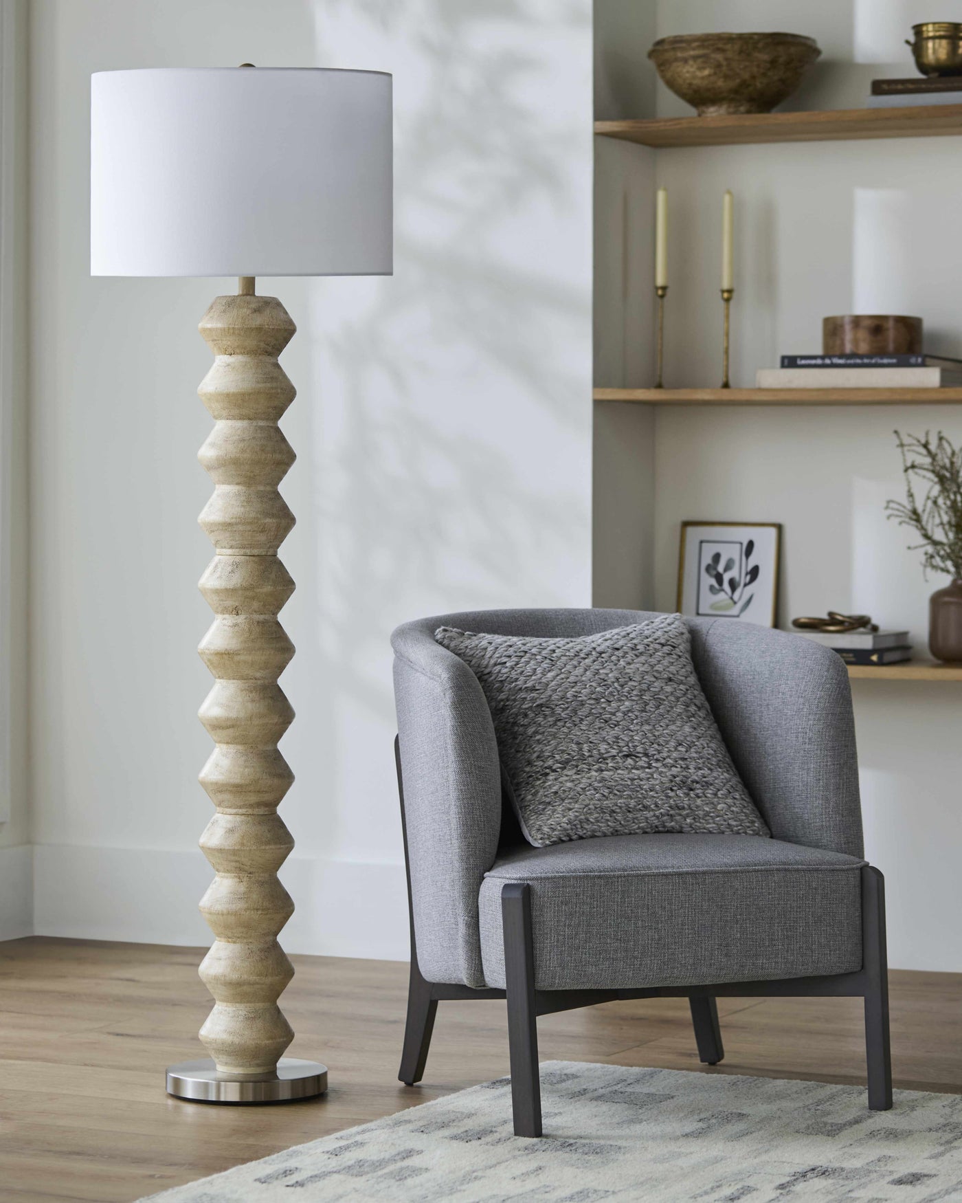 Stacked Resin Column Floor Lamp — Stacked ivory resin column lamp with linen shade and brushed nickel base