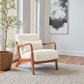 Boucle Fabric Wood-Frame Accent Chair — Cream boucle upholstery meets a curved rubberwood frame for quiet, lasting comfort