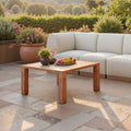 Wood-Grain Aluminum Outdoor Coffee Table — Warm slatted aluminum table built for easy outdoor living year-round