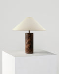 Natural Stone Cylinder Table Lamp — Stone cylinder base and cotton shade for calm, considered bedside light