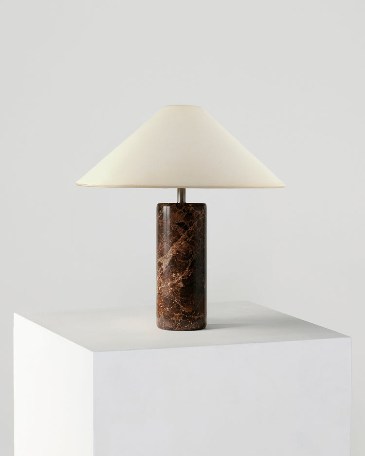 Natural Stone Cylinder Table Lamp — Stone cylinder base and cotton shade for calm, considered bedside light