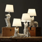 Sculptural Resin Dog Table Lamp — alternate color temperature setting