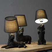 Sculptural Resin Dog Table Lamp styled with ceramics and a linen runner