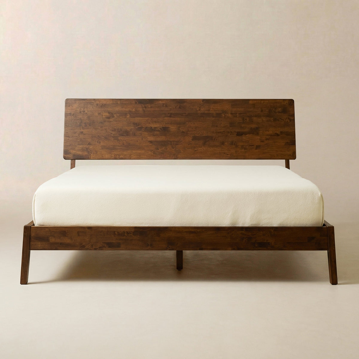 Solid Wood Platform Bed Frame — Low-profile solid wood platform frame with wide-plank headboard and slatted base