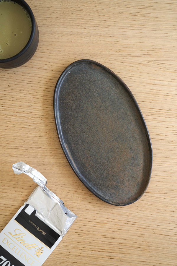Reactive Glaze Oval Stoneware Platter in a styled home setting