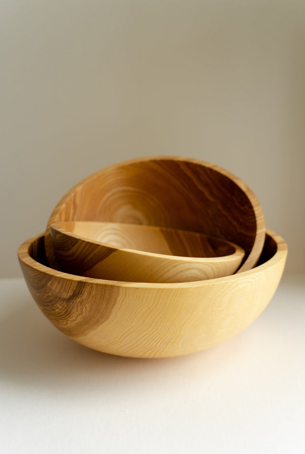 Hand-Carved Wood Nesting Bowl Set — Hand-carved nesting bowls in three sizes, finished with food-safe oil
