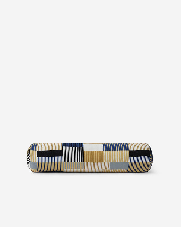 Navy blue bolster pillow with geometric plaid with vertical striped blocks, cylindrical bolster