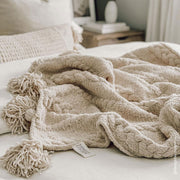 Cable-Knit Pom Pom Throw Blanket