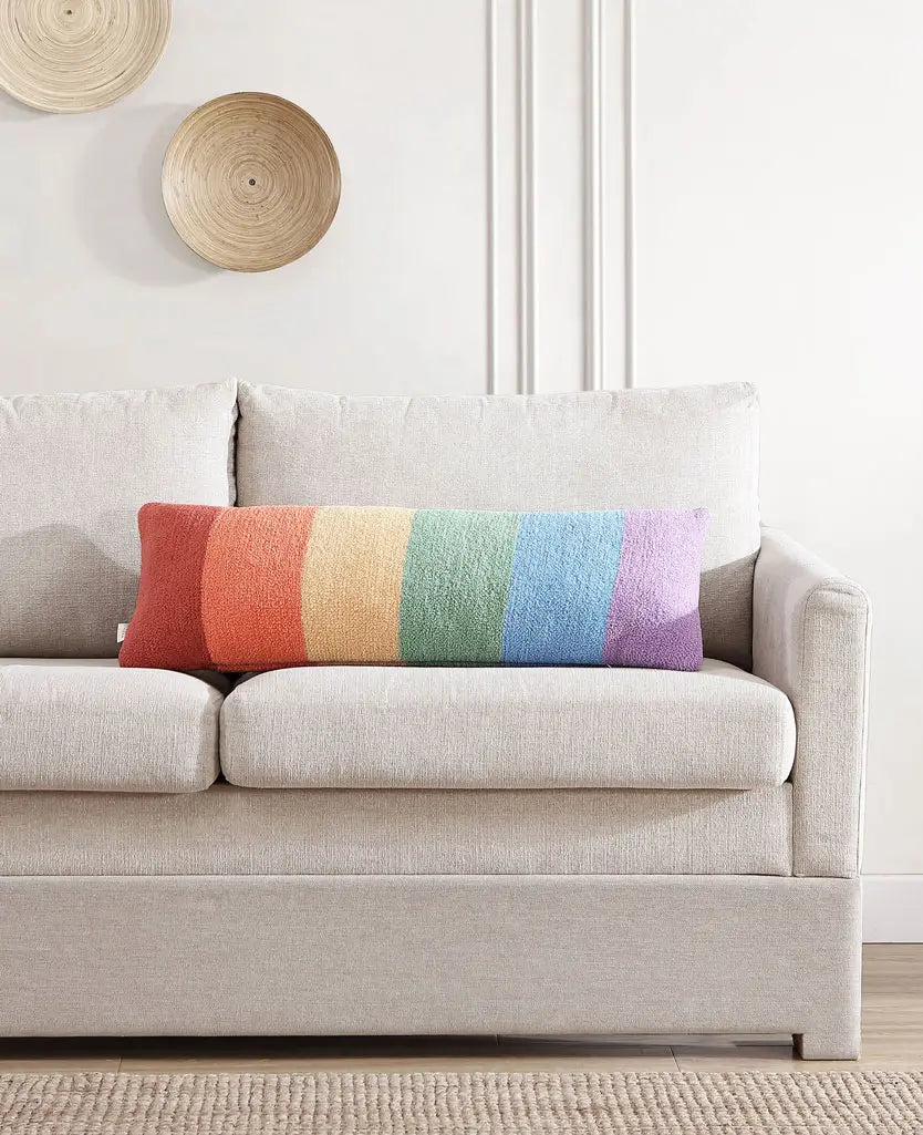 Seven quiet colors across one long pillow