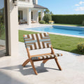 Woven Strap Acacia Folding Lounge Chair — Low-slung folding lounge chair in acacia with woven stripe seating for outdoor use