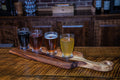 Live Edge Walnut Handled Bread Board — Hand-shaped walnut board with live edge and beeswax finish for daily use