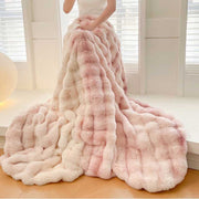 Quilted Faux-Fur Pile Throw draped over a linen sofa arm